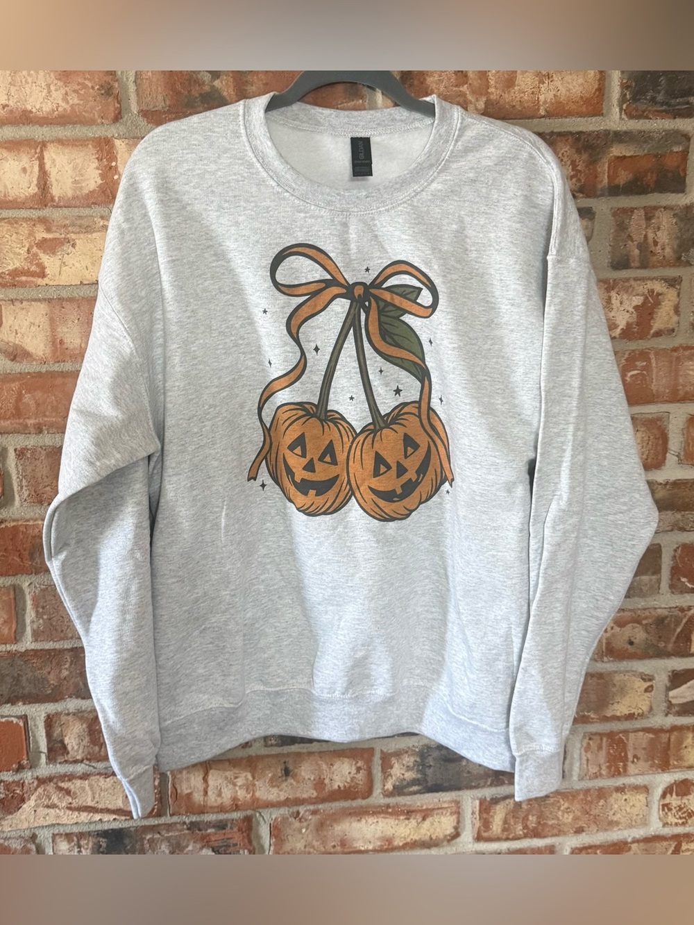 Gildan Ash Gray Crewneck Sweatshirt with Pumpkin Graphic